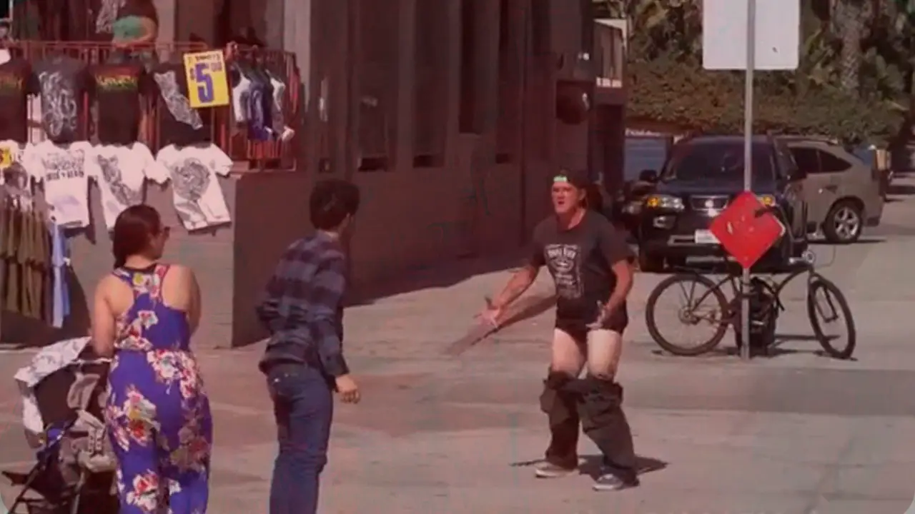 A-man-with-pulled-down-pants-wanting-to-fight-on-the-street